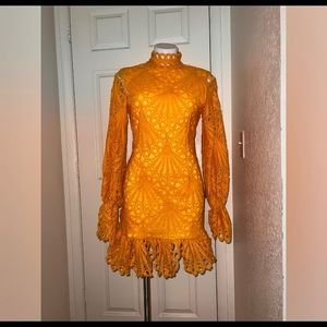 Short, yellow-orange, high neck flirty lace dress